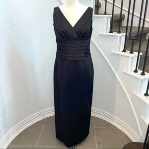 Like new sleeveless v-neck ruched satin black dress with back slit. 12